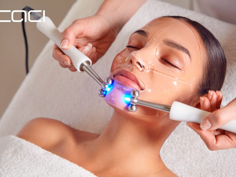 CACI facial treatment with illuminated treatment rollers