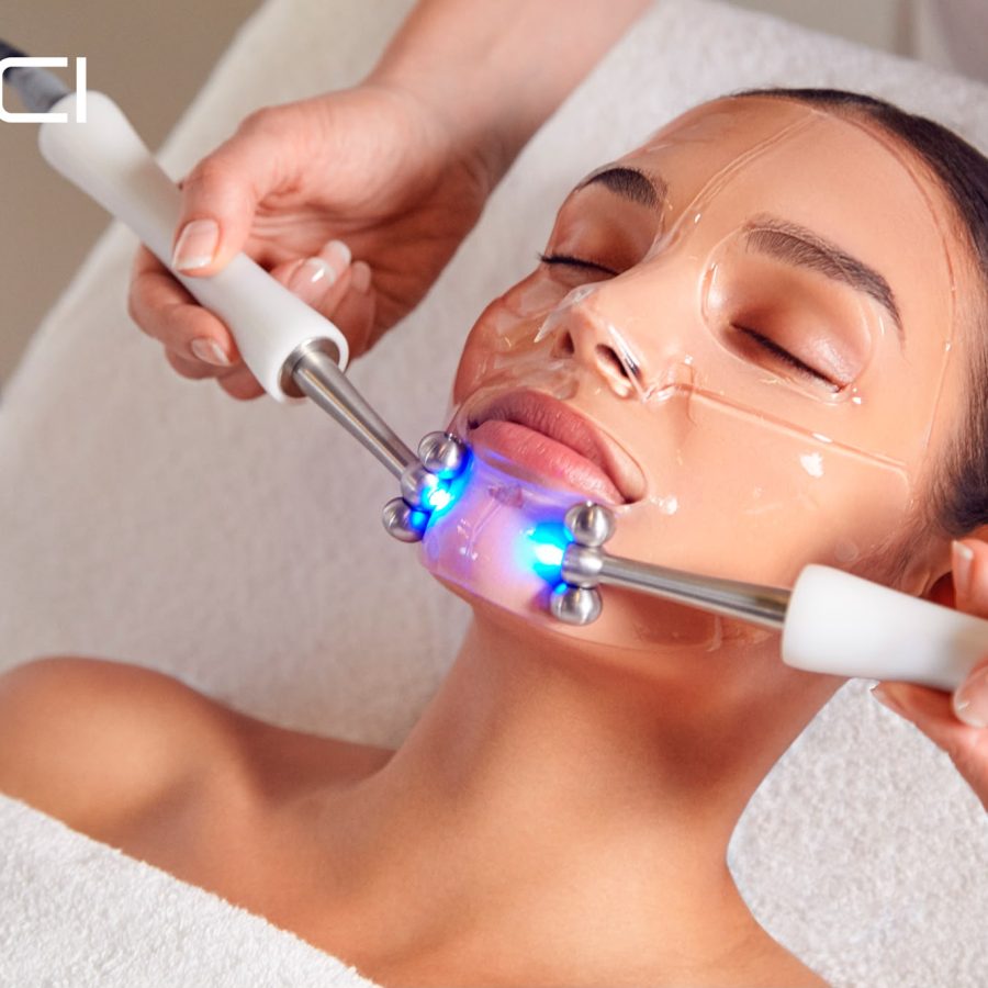 CACI facial treatment with illuminated treatment rollers